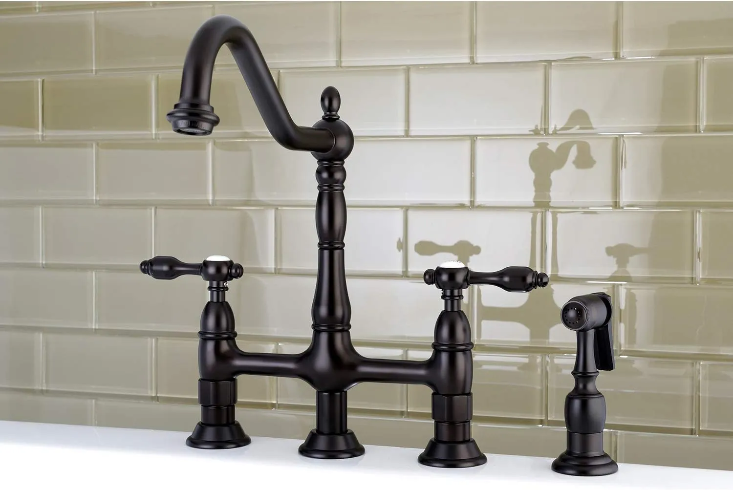 Kingston Brass KS1275TALBS Tudor 8 Inch Center Kitchen Faucet With Brass Sprayer, Oil Rubbed Bronze, 8-3/4 inch in Spout Reach, Oil Rubbed Bronze